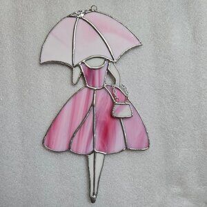 Lady with parasol and purse stained glass